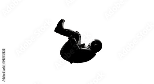 A silhouette of a man falling or jumping in a dynamic pose