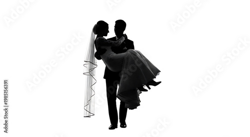 A romantic silhouette of a man holding a woman in a wedding dress