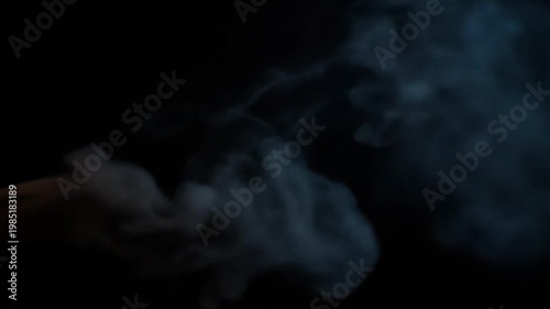 Smoke coming out of a pipe.