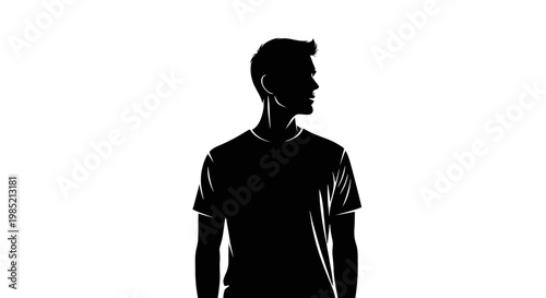 Silhouette of a young man standing.