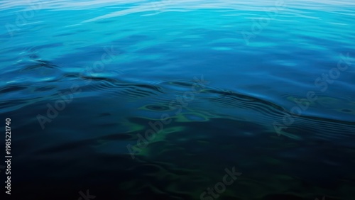 Dark ocean water surface underwater.