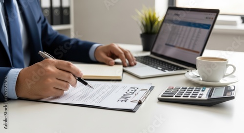 Businessman working on financial documents.