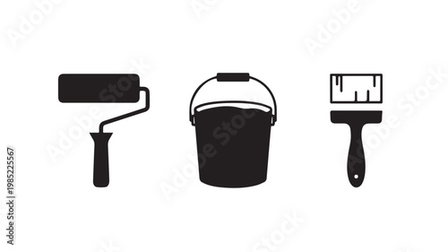 Painting tools and bucket in black silhouette on white background