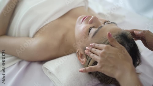 The pretty woman is relaxing at hotel 's massage  and spa. Lifestyle, leisure activity.