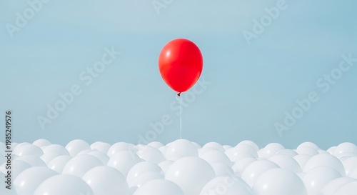 A red balloon floats above a sea of white balloons against a blue sky