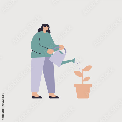 Woman watering a potted plant with a watering can.