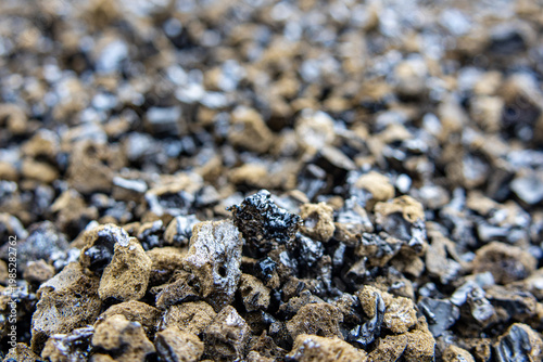 Fotografie Extreme close up of porous volcanic scoria and lapilli on the ground at Hawaii V
