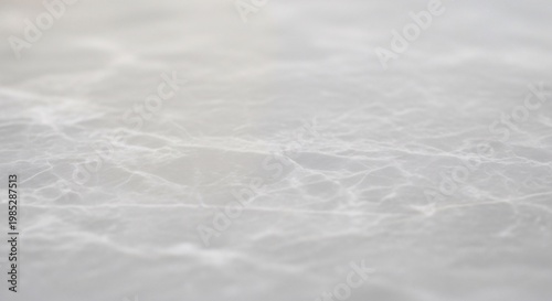 Subtle White Marble Texture Background with Flowing Gray Patterns