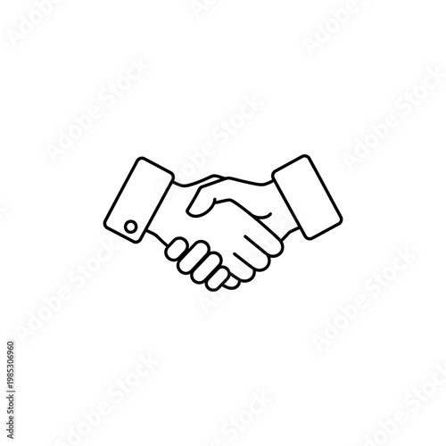 A handshake between two people in a business setting