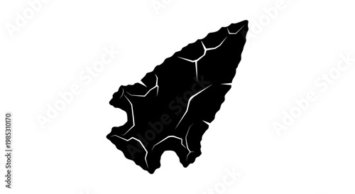 Ancient Arrowhead Silhouette with Cracked Texture
