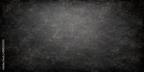 Dark grunge black wall texture backdrop with old vintage grey concrete pattern and blank rough surface material providing copy space for design