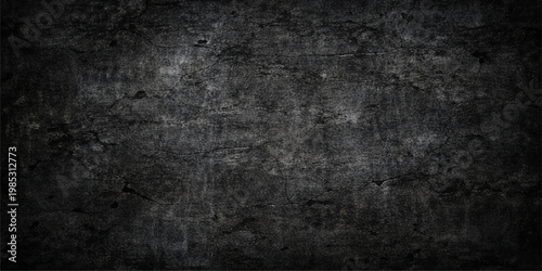 Dark grunge wall background with textured black concrete surface and aged vintage paper pattern design providing blank copy space for a dirty gray stone backdrop