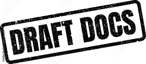 Фотография Distressed rubber stamp reading DRAFT DOCS marking documents in a preliminary de