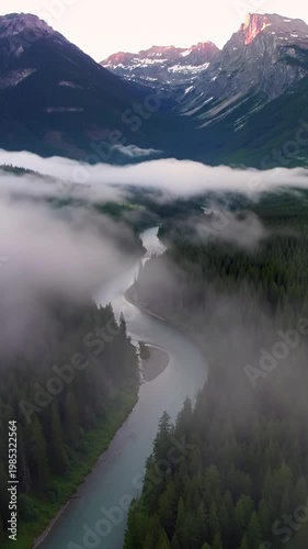 Aerial view of misty mountain river.