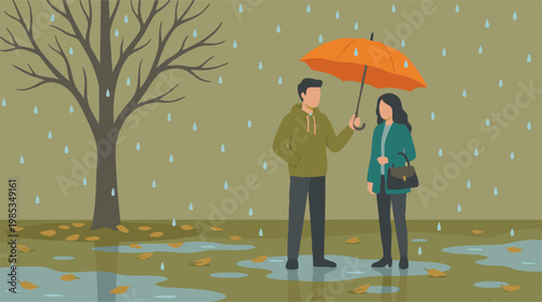 Man protects woman with umbrella in rainy autumn park with fallen leaves