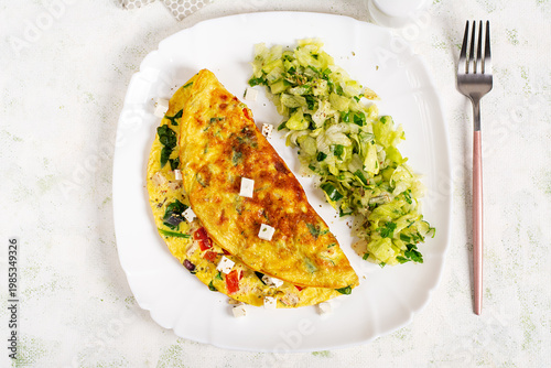 Homemade Omelette with Vegetables and Feta Cheese Flat Lay. Top view