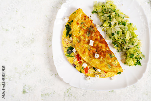 Homemade Omelette with Vegetables and Feta Cheese Flat Lay