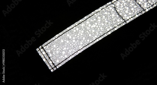 Close-up of cigarette on black background.