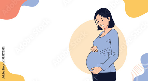 Beautiful pregnant woman in a blue shirt smiling and holding her belly affectionately against a soft abstract backdrop.