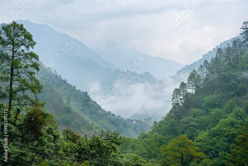 Photography A serene landscape of Madmaheshwar temple in the misty mountains of Uttarakhand,
