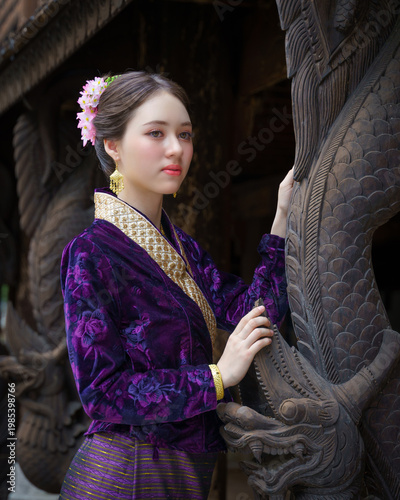 Pretty Asian Women Travellers in traditional Thai dress Lanna style.