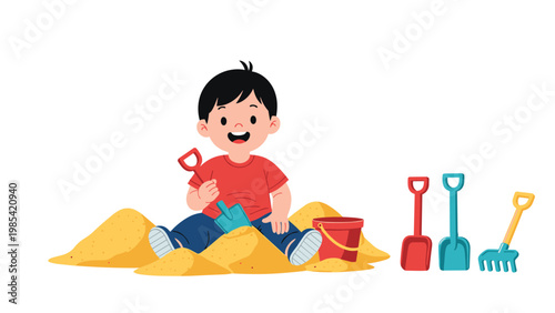 Happy young boy playing in a pile of golden sand with colorful shovels, a bucket, and a rake for summer fun activity.