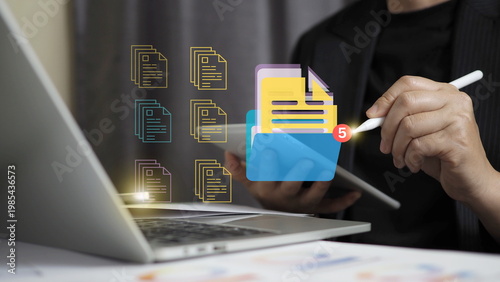 Close-up of a person using a tablet and stylus to manage digital files, featuring a virtual folder icon and organized document layers for efficient paperless office data management.