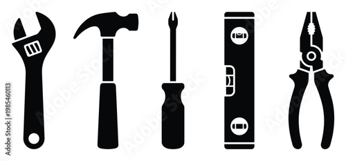 Essential repair and maintenance tools kit including adjustable wrench hammer screwdriver spirit level and pliers suitable for various home improvement and professional construction projects