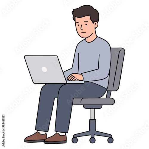 A man sits on a chair typing on his laptop with a focused expression.