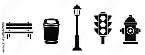 Black silhouette icons of urban street elements including park bench trash can street light traffic light and fire hydrant useful for public service graphics and city planning applications