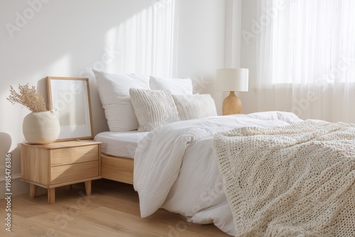 Minimal white bedroom interior with soft natural light