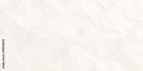 Crumpled white paper texture background with soft folds and creases