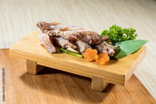 Raw pork rib strips on board