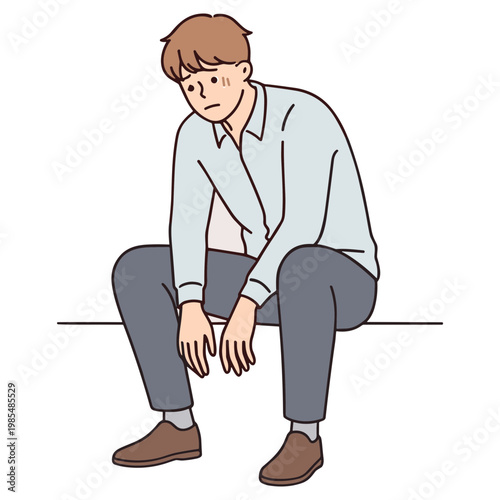 A man sits on a bench looking sad with his head down.