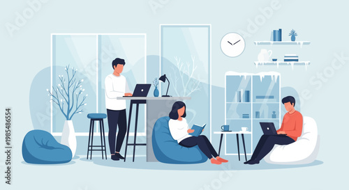 People working and relaxing in a modern co-working space.