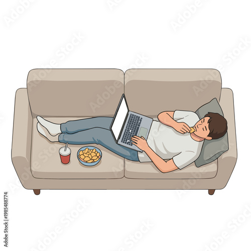A man relaxing on a couch eating snacks while using his laptop