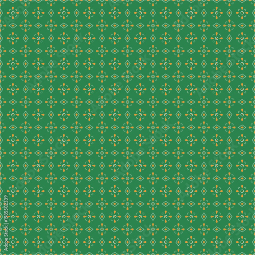 Seamless green and yellow geometric pattern with floral elements