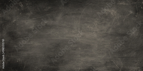Scratched and worn dark gray wall texture background with vintage look and empty space for writing or drawing