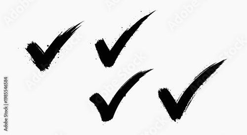 Set of hand-drawn brush stroke check marks isolated on white background. Grunge ink tick symbols for vote, choice, and approval.