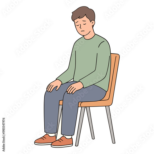 A man sits on a chair looking sad and dejected indoors.