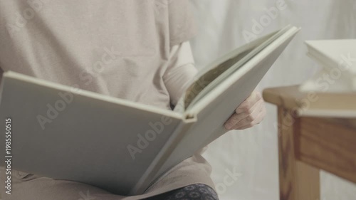 Reading  a book at home