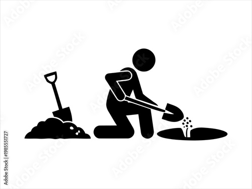 Determined person using a shovel to excavate ground and create a hole
