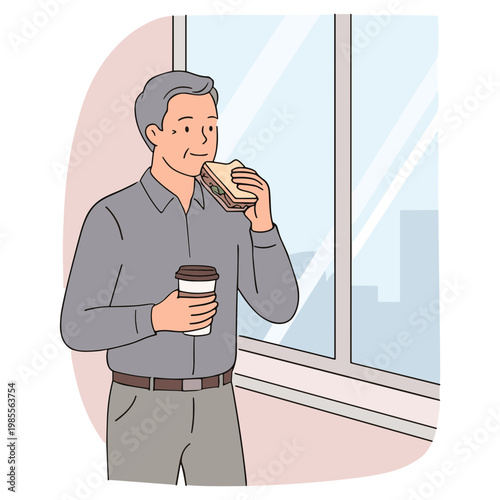 Man eating sandwich and drinking coffee near office building window