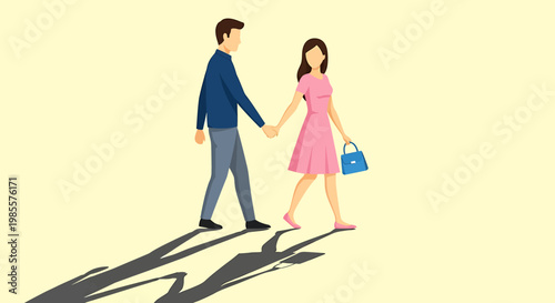 Couple walking hand in hand together with long shadows.