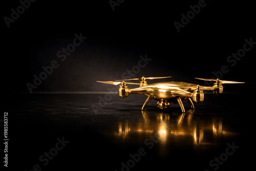 Polished 24k gold drone on dark studio, future tech and modern logistics concept