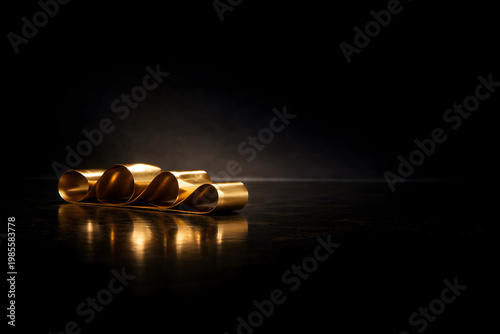 Polished 24k gold measuring tape on premium studio, business precision and scaling concept