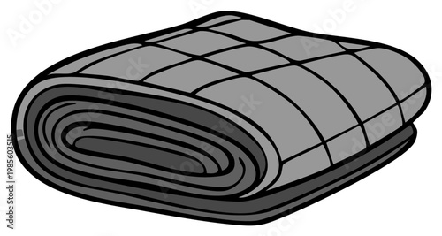 Comfortable grey quilted blanket neatly folded and rolled for cozy rest