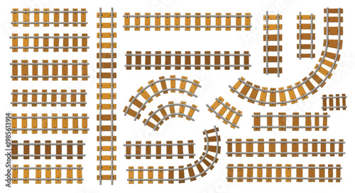 Collection of wooden railway track pieces arranged on a white background