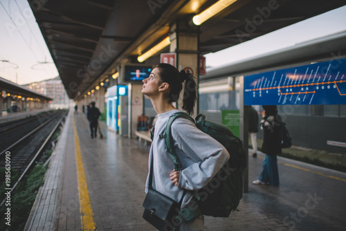 Woman waiting for departure at train station