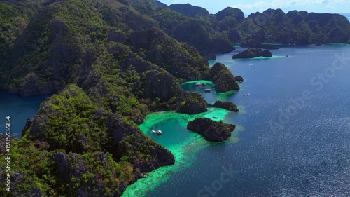 Coron Lagoon with limestone karsts turquoise waters. Best aerial view drone